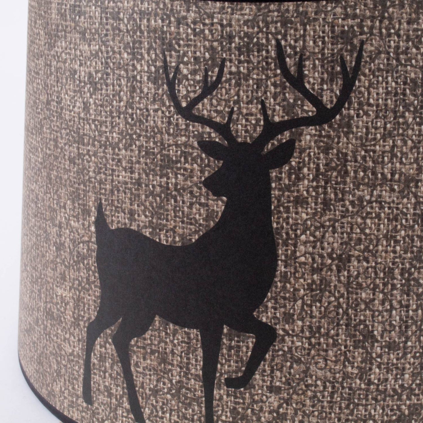 Close-up of a handcrafted parchment lamp shade in natural tones, featuring a woodland deer silhouette, part of Lamps & Lighting, Lamp Shades, and Parts and Accessories collections.