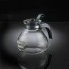 Clear glass whistling kettle with black ergonomic handle and lid, featuring a durable borosilicate carafe ideal for Kitchen & Food and Brewing Coffee and Tea collections.