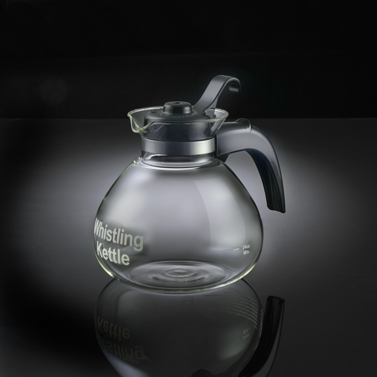 Clear glass whistling kettle with black ergonomic handle and lid, featuring a durable borosilicate carafe ideal for Kitchen & Food and Brewing Coffee and Tea collections.