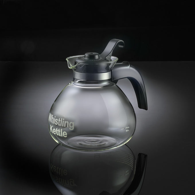 Clear glass whistling kettle with black ergonomic handle and lid, featuring a durable borosilicate carafe ideal for Kitchen & Food and Brewing Coffee and Tea collections.