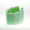Handcrafted green glass spoon rest with scalloped edges, made in the USA, designed to keep kitchen counters neat, featured in Kitchen & Food and USA Made collections.