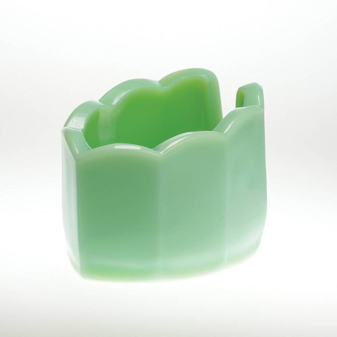 Handcrafted green glass spoon rest with scalloped edges, made in the USA, designed to keep kitchen counters neat, featured in Kitchen & Food and USA Made collections.