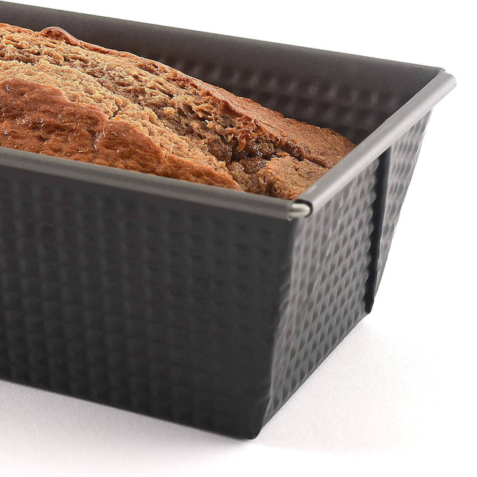 Heavy gauge steel loaf pan with durable nonstick coating, tapered sides, and textured surface for easy release, ideal for Kitchen & Food, Cookware, and Baking Supplies collections.