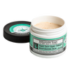 Open container of heavy-duty hand therapy balm with a light beige creamy texture, featuring a white and green label, designed for soothing cracked hands, part of Health & Wellness and USA Made collections.