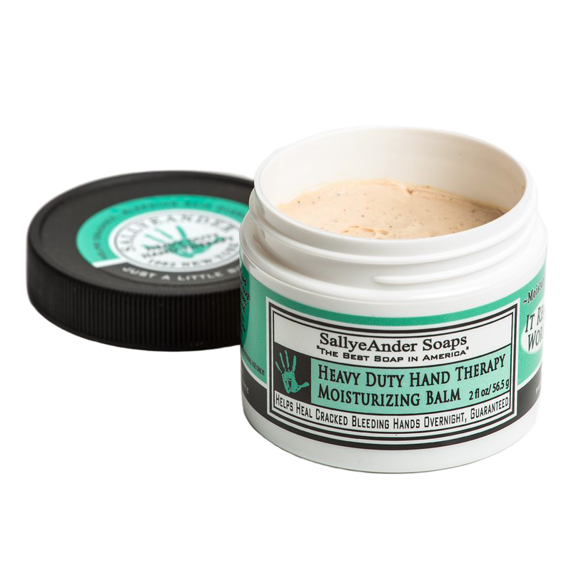 Open container of heavy-duty hand therapy balm with a light beige creamy texture, featuring a white and green label, designed for soothing cracked hands, part of Health & Wellness and USA Made collections.