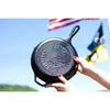 Handcrafted cast iron skillet featuring an embossed American flag and "Made in America" design, perfect for Kitchen & Food, Cookware, Cast Iron, USA Made, and Best Sellers collections.