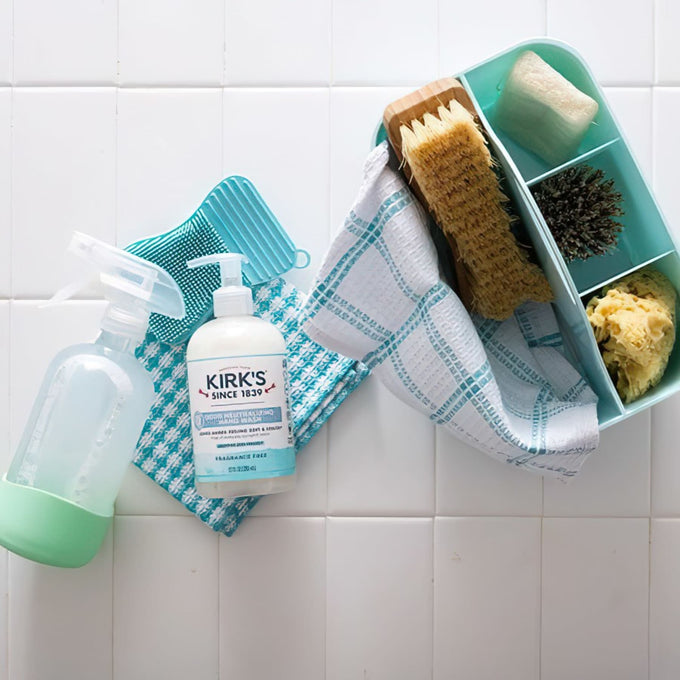 Clear pump bottle of Kirk's Odor Neutralizing Hydrating Hand Wash with fragrance-free formula, surrounded by cleaning brushes, sponge, cloth, and spray bottle, USA made, featured in Health & Wellness, Grooming and Personal Hygiene, and Soaps collections.