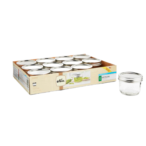 Set of twelve clear glass half-pint wide mouth canning jars with silver lids in a box, made in USA, ideal for food preservation and crafts in Kitchen & Food and Canning collections.