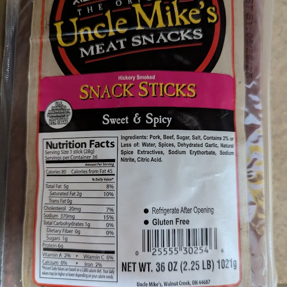 Clear package of handcrafted hickory smoked sweet and spicy snack sticks made with pork and beef, a savory gluten-free treat from USA, ideal for Kitchen & Food, Snacks and Sweets, Meats, USA Made, Best Sellers, Promo Eligible collections.