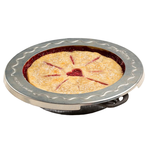 Round aluminum pie crust shield with scalloped edge placed on a pie to prevent crust burning, fits 10-inch pies, ideal for Kitchen & Food, Baking Supplies, and Cooking Helpers collections.
