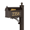 Handcrafted bronze and gold mailbox with personalized street numbers mounted on decorative post, designed to enhance curb appeal in Home & Decor and USA Made collections.