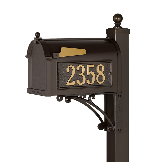 Handcrafted bronze and gold mailbox with personalized street numbers mounted on decorative post, designed to enhance curb appeal in Home & Decor and USA Made collections.