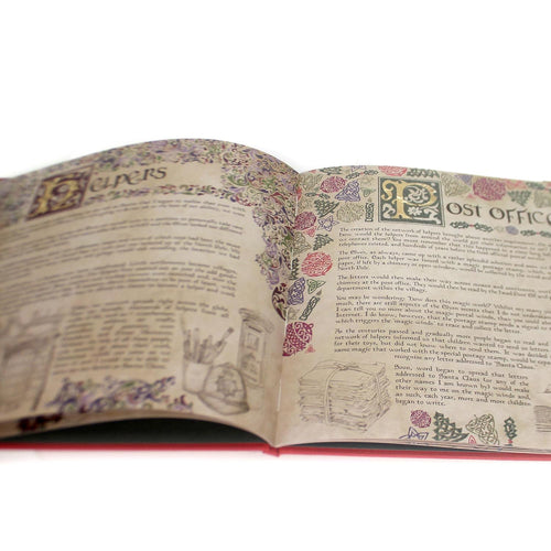 Open pages of a hardcover book featuring detailed vintage-style illustrations and ornate floral borders, part of a festive holiday and children's book collection.