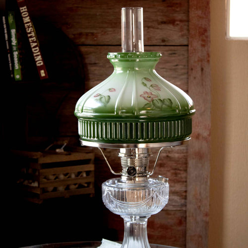 Handcrafted glass oil lamp shade with green gradient and delicate violet floral pattern, designed for lamps with 10" shade rings, ideal for Lamps & Lighting and Best Sellers collections.