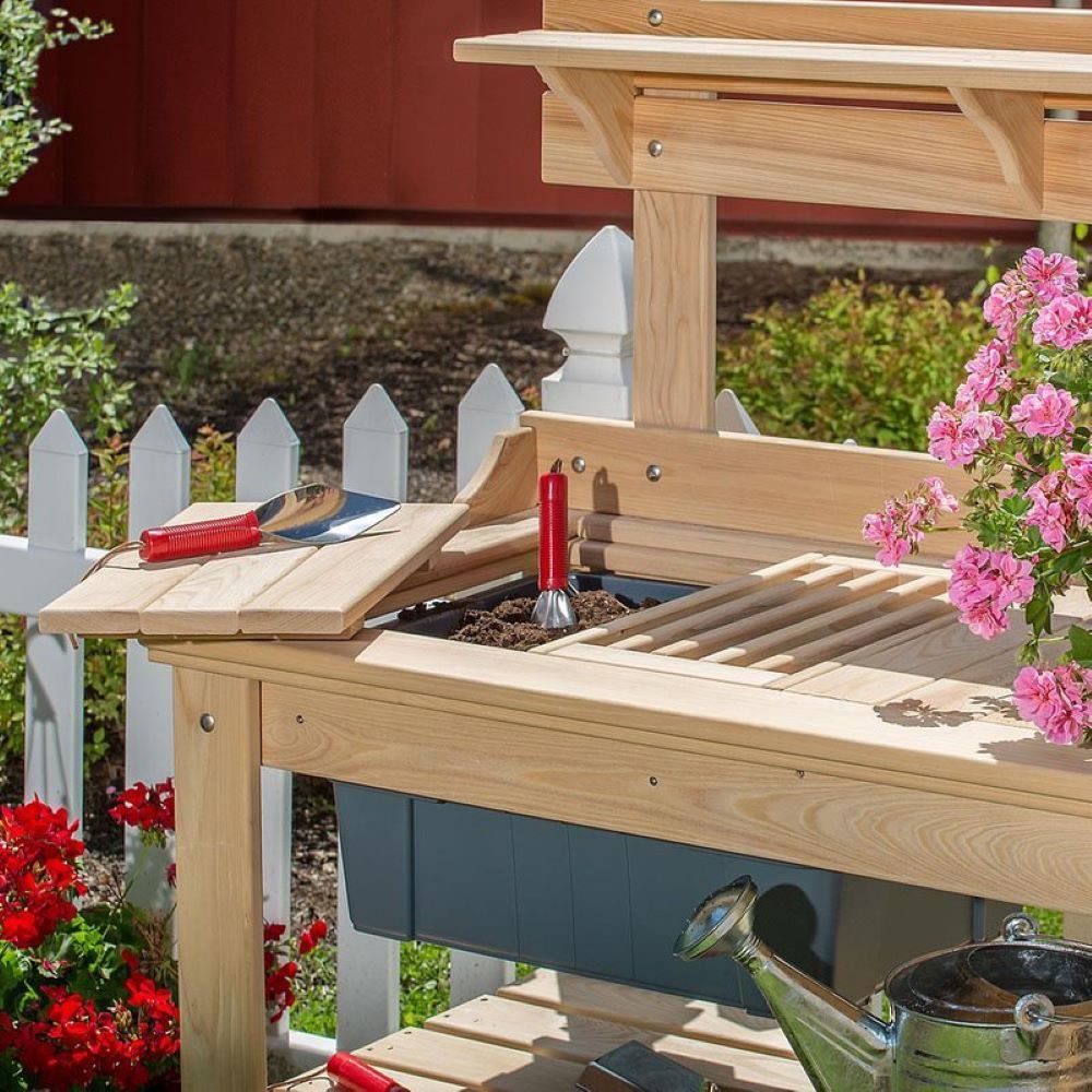 Handcrafted Amish-made cypress wood outdoor potting table with smooth unfinished surface, rubbermaid tote, and garden tools, part of Farm, Garden & Tool, Garden Accessories, USA Made, Amish Made, and Best Sellers collections.