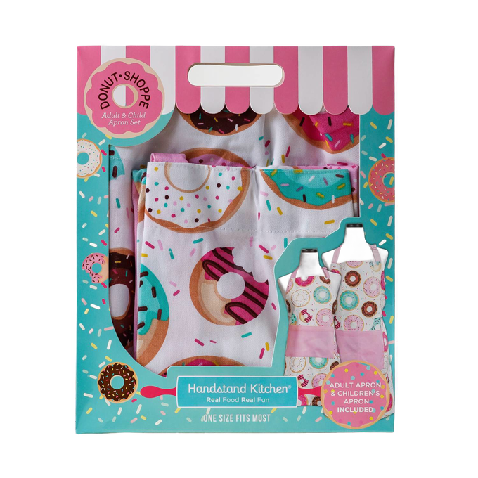 Set of matching aprons for adults and children with colorful donut patterns and large front pockets, designed for cooking and crafts; ideal for Kitchen & Food and Kitchen Textiles collections.