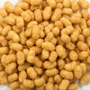 Close-up of crunchy caramel-coated puffcorn pieces with a golden caramel glaze, a popular snack featured in Kitchen & Food, Snacks and Sweets, USA Made, and Best Sellers collections.