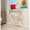 Tall adjustable wooden clothes drying rack with three fabric pieces draped over it, handcrafted by Amish makers, ideal for compact spaces in laundry and home decor.