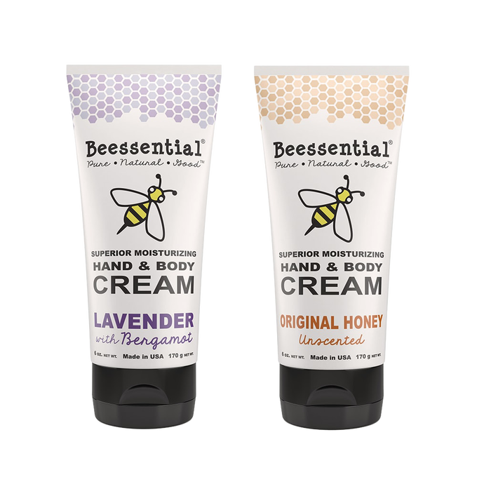 Two 6 fl oz tubes of handcrafted Beessential hand and body cream in lavender with bergamot and original honey unscented varieties, made in USA, featured in Health & Wellness, Balms, Creams and Lotions, USA Made, and Best Sellers collections.