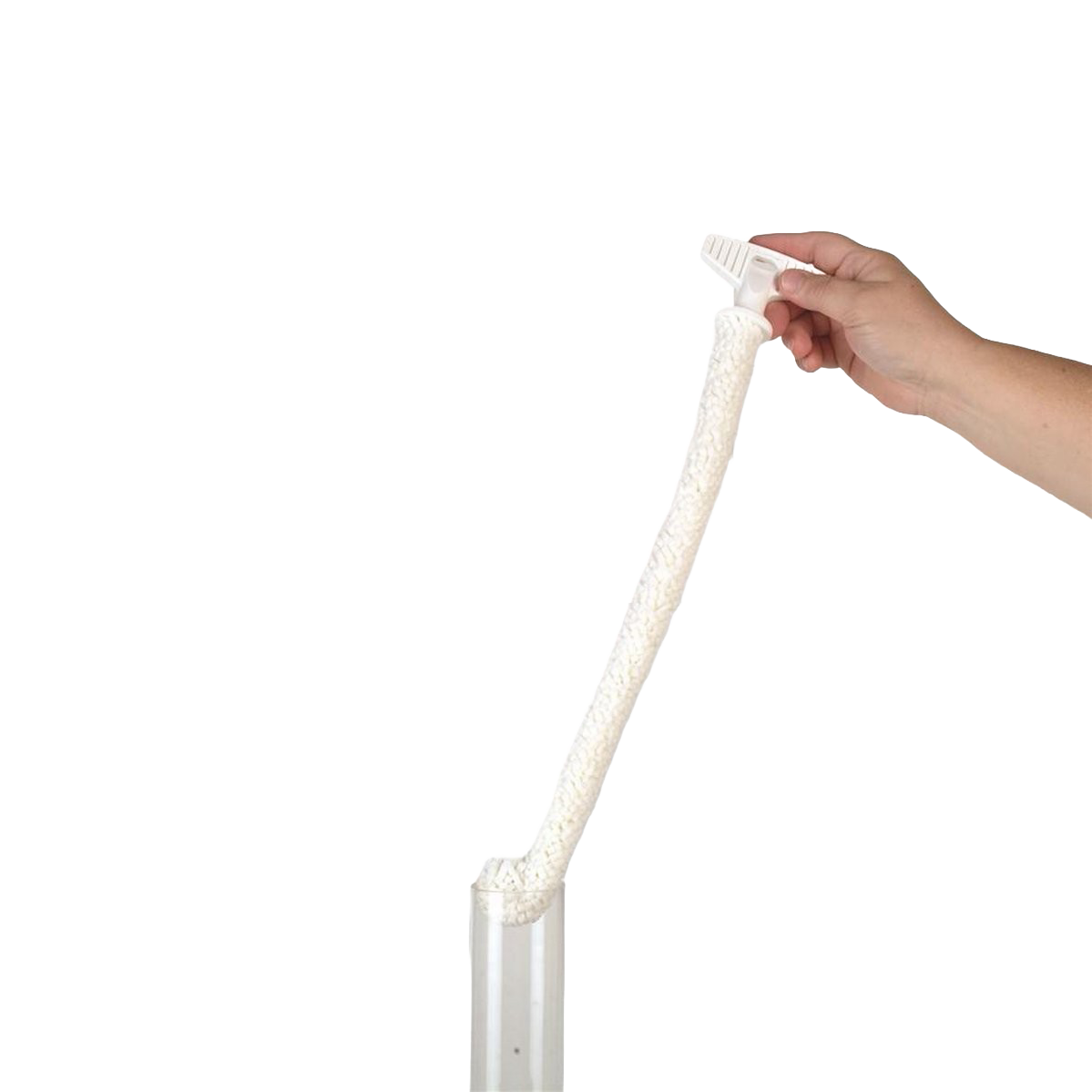 Hand holding a flexible foam brush with a textured cleaning head inserted into a clear oil lamp chimney, designed for gentle and thorough cleaning of glass chimneys, USA made accessory.