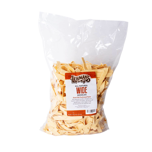 Clear plastic bag filled with handcrafted wide egg noodles, made in USA, ideal for Kitchen & Food, Food, Pantry, USA Made, Best Sellers, and Promo Eligible collections.