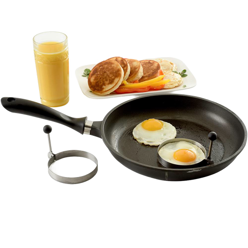Set of two handcrafted stainless steel pancake rings with stay-cool handles shown with eggs cooking in a black nonstick frying pan, next to a plate of pancakes and glass of orange juice, ideal for Kitchen & Food, Kitchen Gadgets, Cooking and Baking Helpers, Best Sellers, Promo Eligible collections.