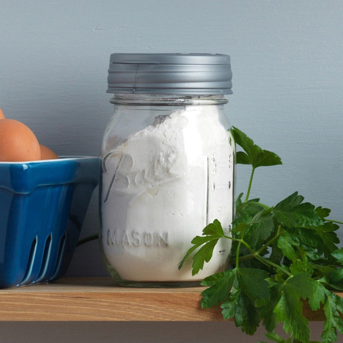 Handcrafted regular mouth Mason jar with gray flip top lid filled with white powder, displayed on wooden shelf with fresh parsley and blue egg carton, featured in Home & Decor, Kitchen Gadgets, Household Helpers, and Storage and Serving collections.