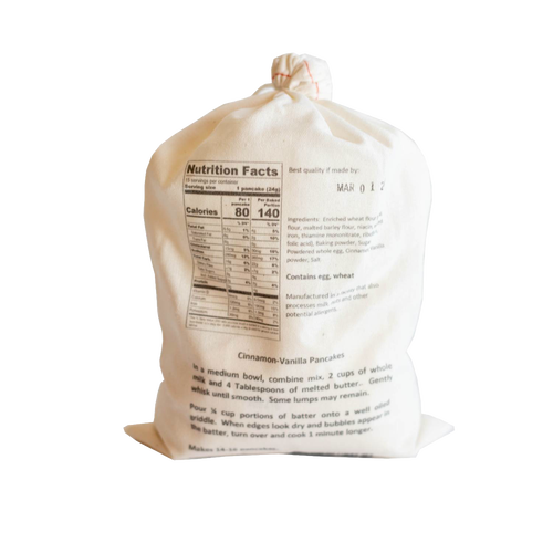 Natural fabric drawstring bag of handcrafted Lehman's exclusive pancake mix with printed nutrition facts, ingredient list, and preparation directions, ideal for Kitchen & Food, Pantry, Dry Goods and Mixes, Best Sellers, and Promo Eligible collections.