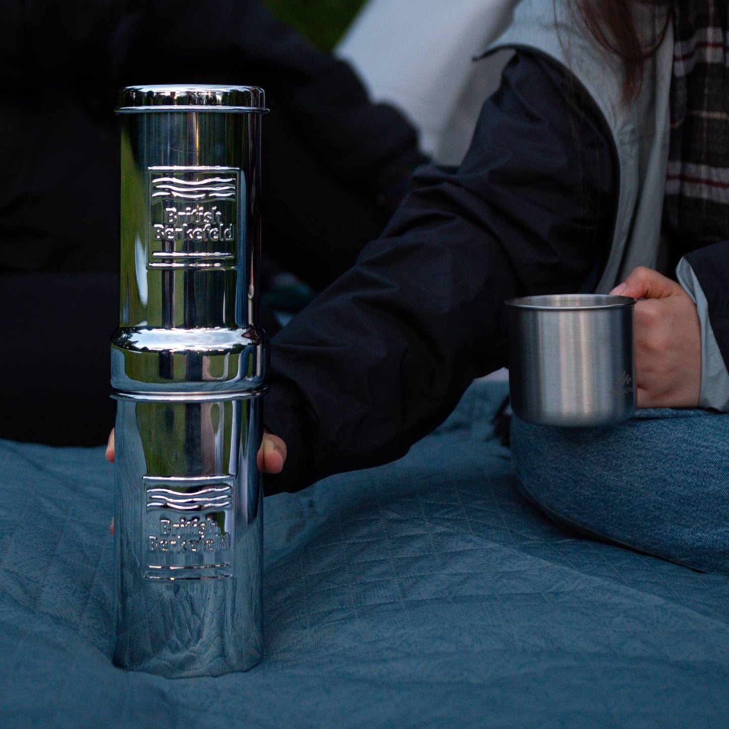 Portable polished gravity water filter with stainless steel body, ideal for camping and emergency supplies, featured in Farm, Garden & Tool and Water Heating and Treatment collections.