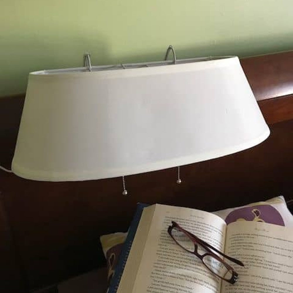 Ivory-colored double headboard lamp with two hanging hooks and on/off pull chains, providing focused light over the shoulder, ideal for Home & Decor and Lamps & Lighting collections.