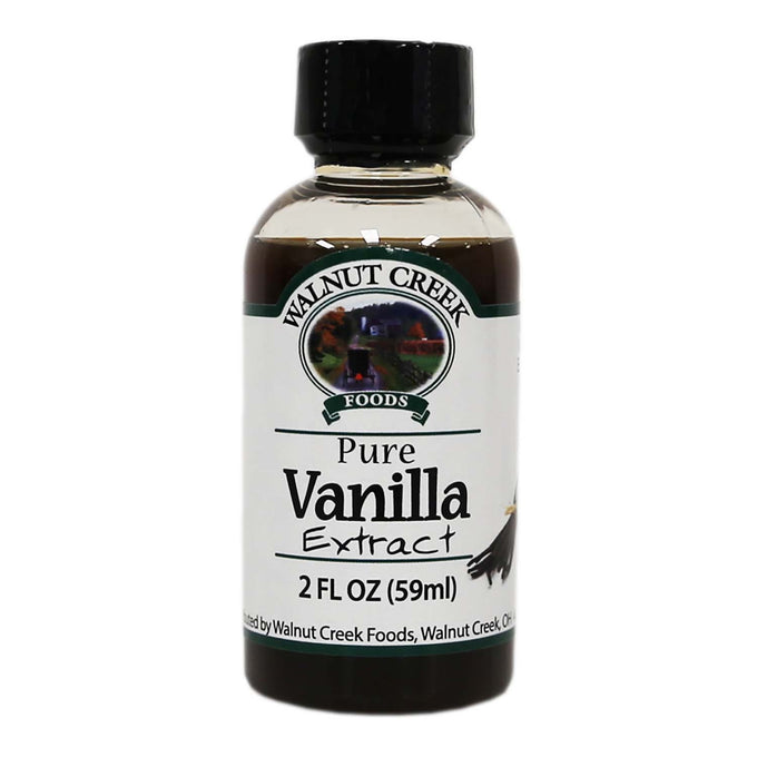 Small 2-ounce dark glass bottle of pure vanilla extract with a white label featuring Walnut Creek Foods branding, suitable for Kitchen & Food, Pantry, and Best Sellers collections.