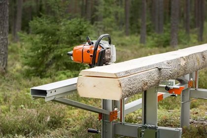 Ultralight portable chain sawmill with two log lifts cutting a large log into lumber outdoors, designed for easy use in Farm, Garden & Tool, Wood Cutting and Hauling, and Best Sellers collections.