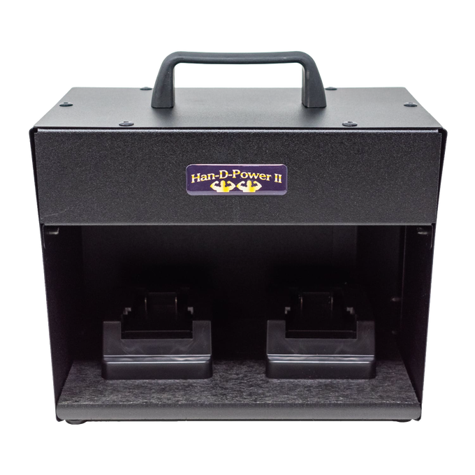 Compact black metal inverter with handle and dual battery slots designed to convert power tool battery current to clean AC power, suitable for farm, garden, and emergency use.