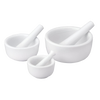 Set of three white porcelain mortars and pestles in small, medium, and large sizes designed for efficient food prep, part of Kitchen & Food, Food Prep, and Cooking Helpers collections.