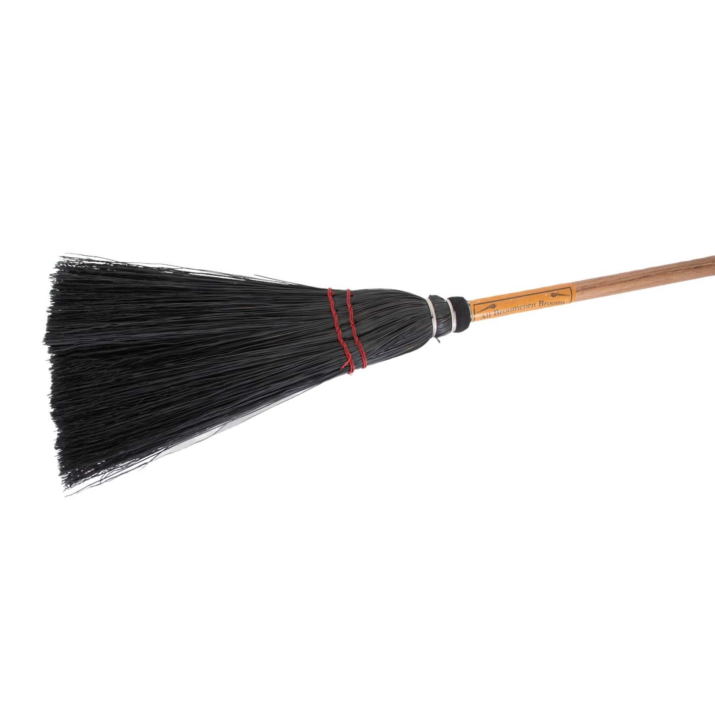 Handcrafted Amish-made broom with natural straw bristles bound by red twine and a smooth wooden handle, ideal for cleaning hearths and fireplaces in USA Made and Hearth Accessories collections.