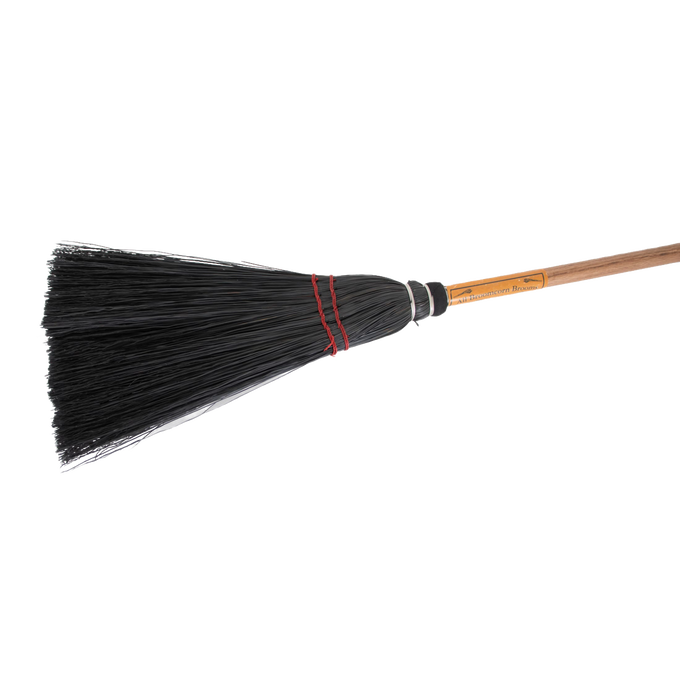 Handcrafted Amish-made broom with natural straw bristles bound by red twine and a smooth wooden handle, ideal for cleaning hearths and fireplaces in USA Made and Hearth Accessories collections.