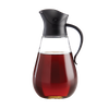 Elegant syrup dispenser with a drip-free, gravity-operated lid and curved handle, perfect for Kitchen & Food, Storage and Serving, Best Sellers, and Promo Eligible collections.