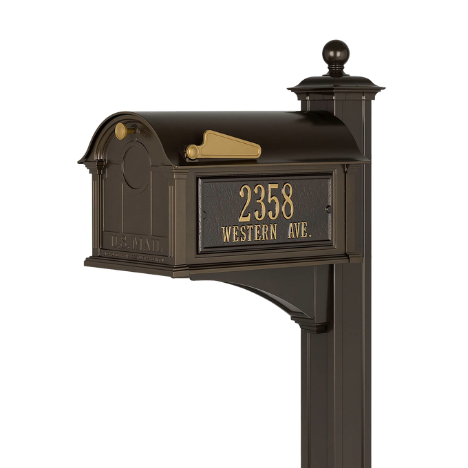 Handcrafted bronze and gold mailbox with raised address numbers on front, mounted on a decorative post, made in USA, featured in Home & Decor and Mailboxes and Address Signs collections.