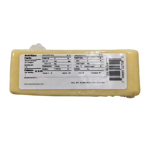 Block of handcrafted Lacey Baby Swiss cheese with nutrition facts label showing zero carbohydrates, 9g total fat, 6mg cholesterol, and made in USA, ideal for Kitchen & Food and Meats collections.