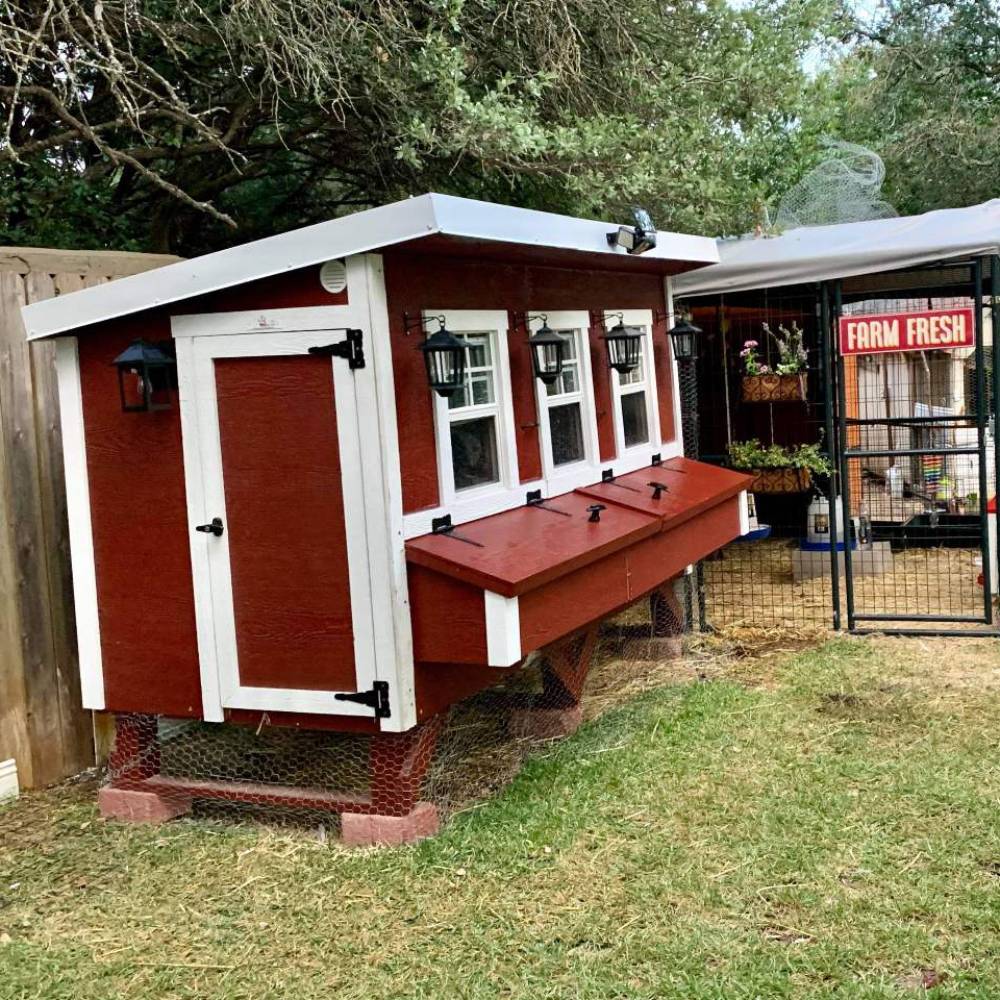 Handcrafted Amish-made heavy-duty wooden chicken coop in red with white trim, featuring secure access door, multiple windows, nesting box, and wire mesh enclosure, ideal for Farm, Garden & Tool, Chicken Accessories, USA Made, Amish Made, and Best Sellers collections.