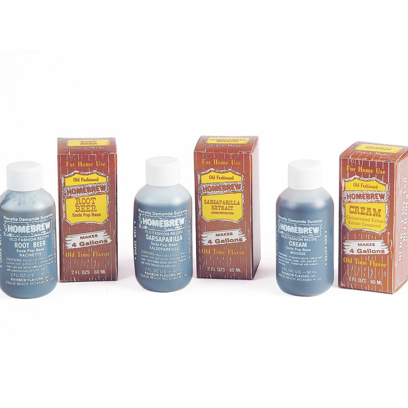 Three 2-ounce bottles of handcrafted soda pop extract in blue labeled containers with matching vintage-style cardboard boxes, featured in Kitchen & Food, Beverages, Best Sellers, and Promo Eligible collections.