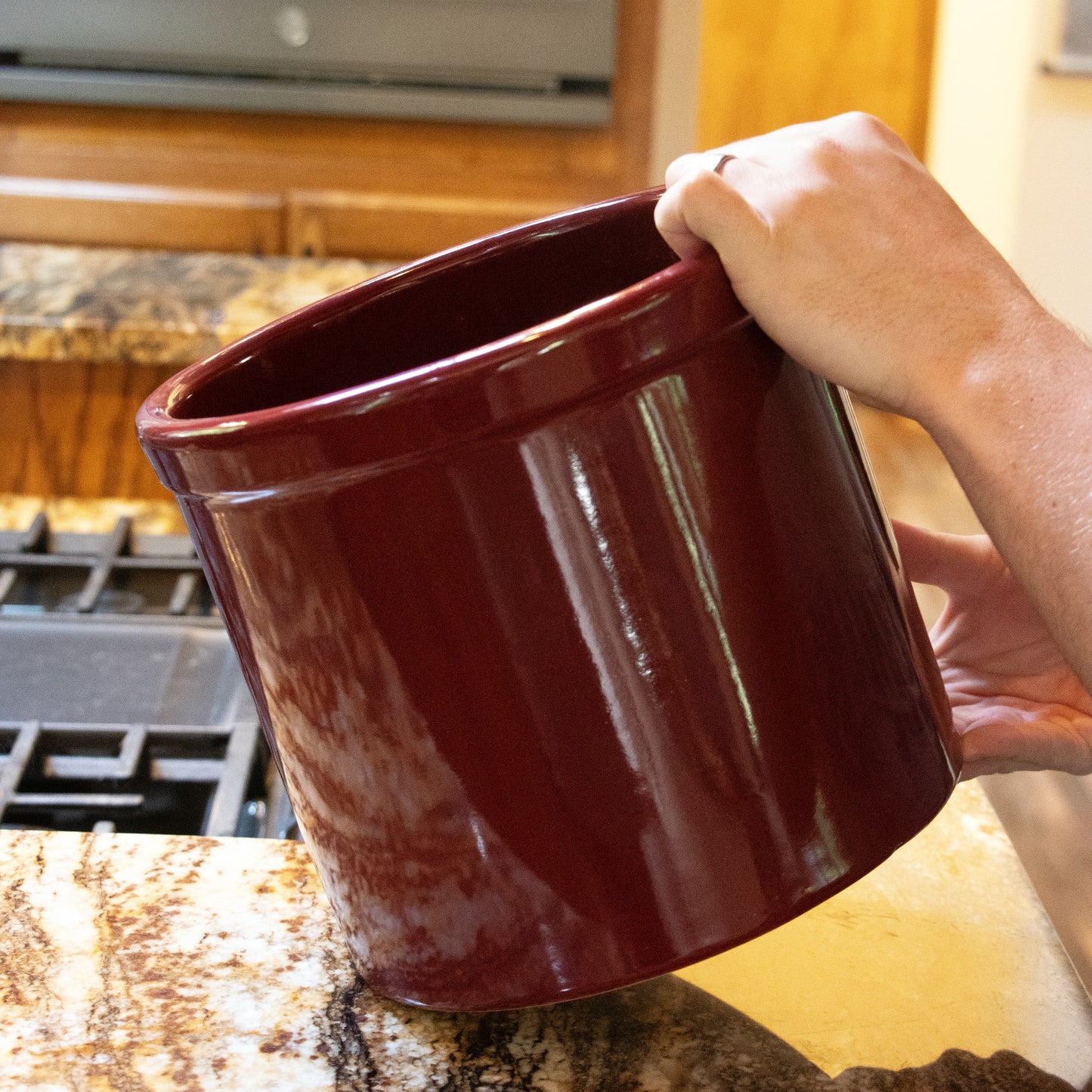 Handcrafted 2-gallon stoneware crock in deep red with a smooth, lead-free, food-safe glaze, ideal for fermenting and food preservation, featured in Kitchen & Food and USA Made collections.