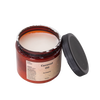 Amber jar of pure coconut oil for soapmaking with a black screw-top lid removed, featuring a simple paper label, ideal for Health & Wellness, Soapmaking Supplies, and USA Made collections.