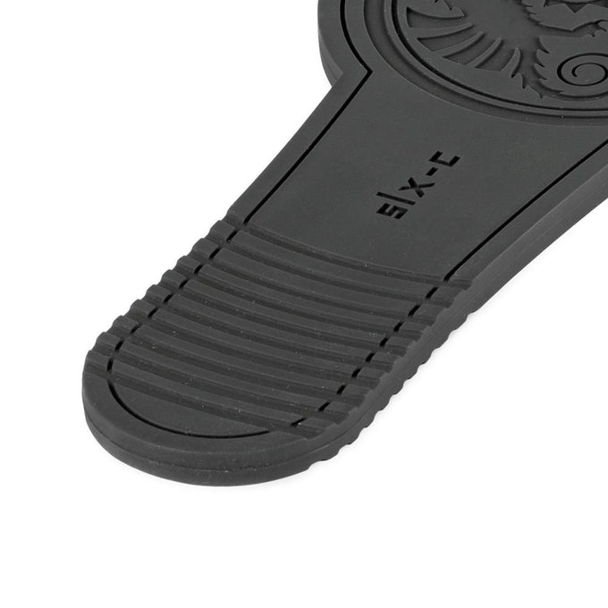 Close-up of a black silicone trivet arm with textured ridges for enhanced grip, designed for use in Farm, Garden & Tool, Kitchen & Food, Camping, Cookware, and Cast Iron collections.