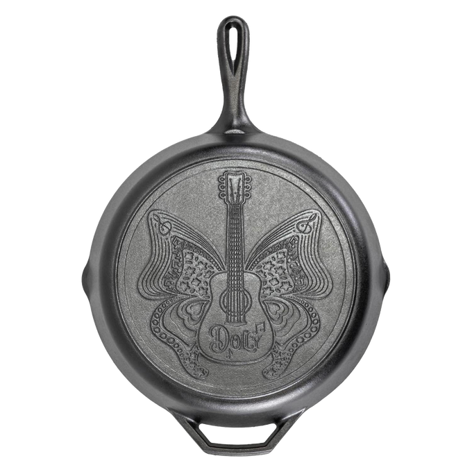 12-inch cast iron skillet featuring a detailed butterfly and guitar design with "Dolly" inscription, handcrafted in the USA, ideal for Kitchen & Food, Cast Iron, Cookware, Best Sellers, and Promo Eligible collections.