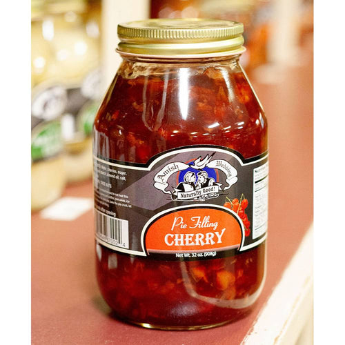 Glass jar of handcrafted Amish-made cherry pie filling with natural ingredients, free from corn syrup and artificial coloring, featured in Kitchen & Food, Pantry, USA Made, and Best Sellers collections.