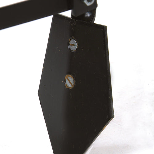 Close-up of a solid steel blade attached with adjustable screws, part of a handcrafted Amish-made cultivator designed for efficient digging and cultivating, made in USA.