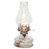 Clear glass oil lamp with a bright flame, featuring a decorative base and standard burner, ideal for emergency lighting and farm, garden, and tool use.