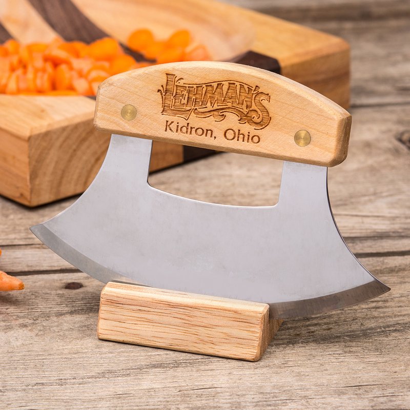 Handcrafted amish made curved chopping knife with wooden handle engraved Lehman’s Kidron Ohio, displayed on wooden stand, ideal for Farm, Garden & Tool and Kitchen Knives collections.