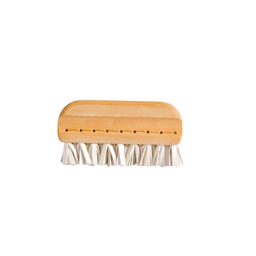 Handcrafted lint brush with a smooth wooden handle and durable bristles, designed for gentle removal of pet hair and lint from upholstery, featured in Home & Decor and Household Cleaning collections.